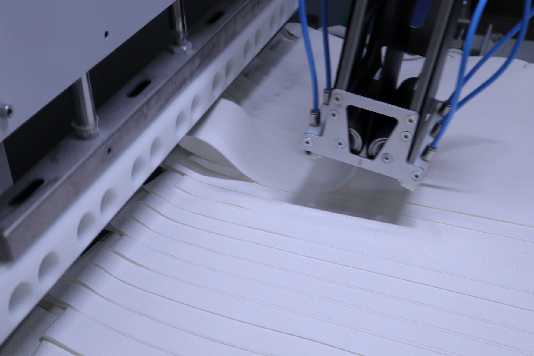 Festooning Solution for delicate and tensionsensitive nonwovens